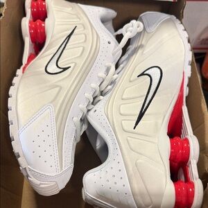 Nike White Sneakers with Black Swoosh and Red Shox